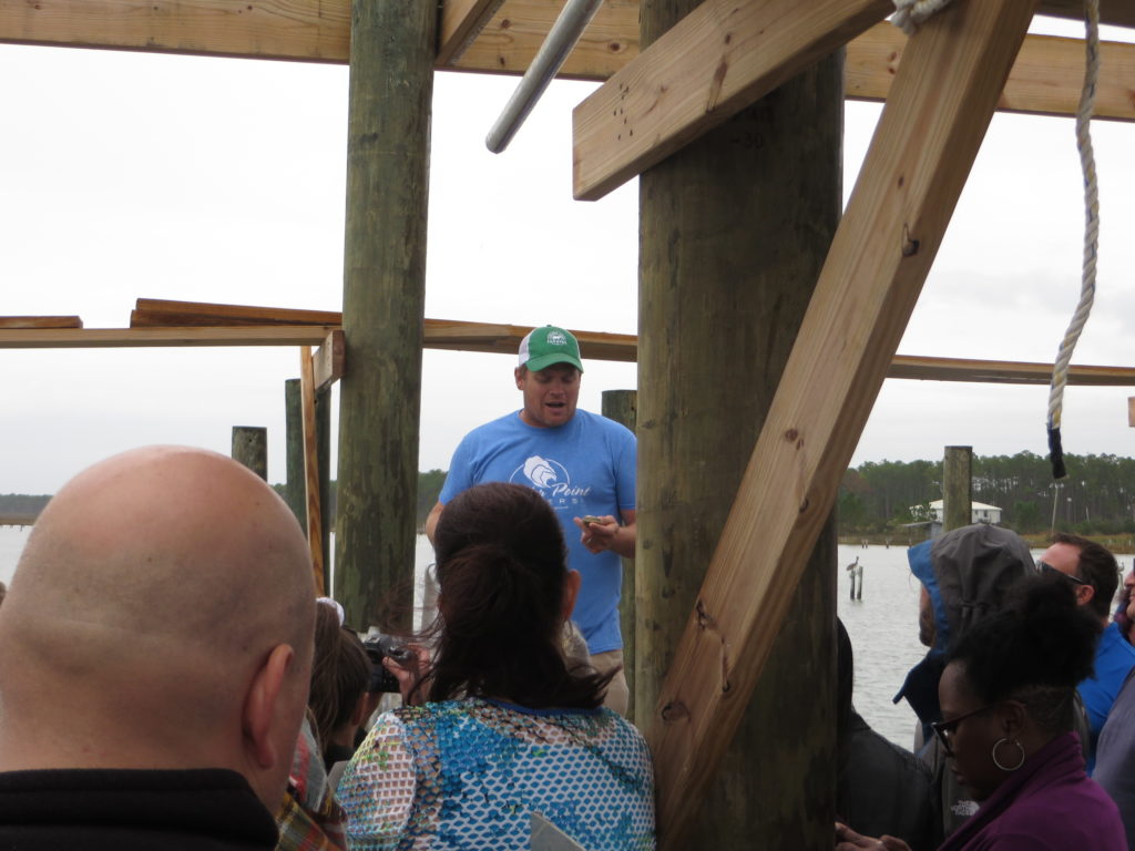 Lane Zirlatt talks to food bloggers about his passion -- growing oysters.